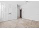 Spare bedroom featuring closet, carpet, and fresh, white paint at 683 Campo Ln, Davenport, FL 33837