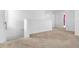 Hallway featuring neutral carpet and fresh, white paint at 683 Campo Ln, Davenport, FL 33837