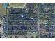 Aerial view of expansive land with scattered homes, offering a sense of space and privacy at 736 Guy Rd, Orlando, FL 32828