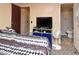 Cozy bedroom with carpet flooring and convenient access to an ensuite bathroom at 736 Guy Rd, Orlando, FL 32828
