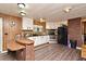 Charming kitchen with wood accents, modern appliances, and ample counter space at 736 Guy Rd, Orlando, FL 32828