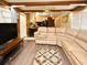 Inviting living room with comfortable seating, ceiling fan, and natural light at 736 Guy Rd, Orlando, FL 32828
