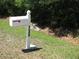 Close-up of the white, country-style mailbox labeled with the house number at 736 Guy Rd, Orlando, FL 32828