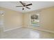 Bedroom featuring tile floors and a window overlooking the private pool at 854 Mendoza Dr, Kissimmee, FL 34758