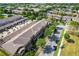 Scenic aerial view of neighborhood townhomes and green spaces in a well-planned community at 9112 Grey Moss Dr, Orlando, FL 32832