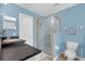 Bathroom with a stand up shower, toilet, and countertop sink at 9112 Grey Moss Dr, Orlando, FL 32832