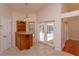 Breakfast nook with wooden floors and doors to screened-in patio and backyard at 9681 Lake Douglas Pl, Orlando, FL 32817