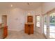 Light and bright breakfast nook area with view to backyard and pool at 9681 Lake Douglas Pl, Orlando, FL 32817