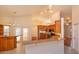 Open kitchen features granite counter, stainless steel appliances and plenty of cabinet storage at 9681 Lake Douglas Pl, Orlando, FL 32817
