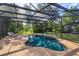 Sparkling screened pool with sun loungers and mature trees providing backyard privacy at 9681 Lake Douglas Pl, Orlando, FL 32817