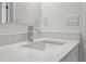 Bathroom sink with modern faucet and quartz countertop at 9919 Cypress Park Dr, Orlando, FL 32824