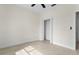 Bedroom with closet, white trim, and neutral tile at 9919 Cypress Park Dr, Orlando, FL 32824