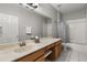 Bathroom with single vanity and a shower-tub combination at 10166 Hidden Dunes Ln, Orlando, FL 32832