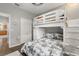 bedroom featuring a unique bunk bed and ample storage space at 10166 Hidden Dunes Ln, Orlando, FL 32832