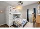 Shared bedroom featuring custom built-in bunkbeds and a playful giraffe at 10166 Hidden Dunes Ln, Orlando, FL 32832