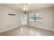 Bedroom with large window, a ceiling fan, and neutral walls at 1030 Blue Horizon Dr, Deltona, FL 32725