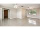 Spacious living area featuring tile floors and plenty of natural light at 1030 Blue Horizon Dr, Deltona, FL 32725