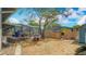 The backyard is perfect for Gathering fun, offering a playset, a large yard, and a screened pool area at 105 Elizabeth Ave, Altamonte Springs, FL 32701