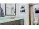 Modern bathroom features a sleek vanity, decorative shelves and updated fixtures at 105 Elizabeth Ave, Altamonte Springs, FL 32701