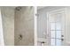 Bathroom with shower and updated features near the back door at 105 Elizabeth Ave, Altamonte Springs, FL 32701