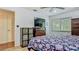 Comfortable bedroom features neutral walls, a ceiling fan and large window providing ample natural light at 105 Elizabeth Ave, Altamonte Springs, FL 32701