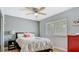 Bedroom featuring a ceiling fan and a sunny window at 105 Elizabeth Ave, Altamonte Springs, FL 32701