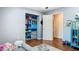 Bedroom with custom shelving and closet offers ample storage at 105 Elizabeth Ave, Altamonte Springs, FL 32701