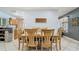 Bright dining area showcasing tile floors, and view of the backyard and dining area at 105 Elizabeth Ave, Altamonte Springs, FL 32701
