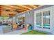Enjoy outdoor living on this covered patio with view of screened in pool at 105 Elizabeth Ave, Altamonte Springs, FL 32701