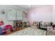 Bright playroom features a large window and hardwood floors at 105 Elizabeth Ave, Altamonte Springs, FL 32701