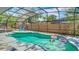 Enjoy this screened pool with clear water and fun pool toys, perfect for outdoor entertaining and relaxation at 105 Elizabeth Ave, Altamonte Springs, FL 32701