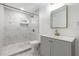 Well-lit bathroom features a modern walk-in shower, vanity, and elegant fixtures at 120 East St, Altamonte Springs, FL 32701