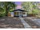 Charming single-story home with a walkway and fenced yard, perfect for outdoor enjoyment at 120 East St, Altamonte Springs, FL 32701