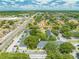 Aerial view showcases the property's convenient location, lush landscaping, and nearby amenities at 130 Lewfield Cir # 130, Winter Park, FL 32792