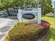 Welcoming entrance to The Stratford community with attractive landscaping, signage, and well-kept surroundings at 130 Lewfield Cir # 130, Winter Park, FL 32792