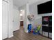 Bright bedroom featuring a modern toy organizer, and an adjacent bathroom at 14743 Driftwater Dr, Winter Garden, FL 34787