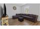 Comfortable living room showcasing a large sectional sofa, ottoman, and modern decor at 14743 Driftwater Dr, Winter Garden, FL 34787