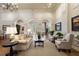 Bright lobby with hardwood flooring, comfortable seating, and stylish decor at 14743 Driftwater Dr, Winter Garden, FL 34787