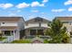 Aerial view of backyard featuring a screened pool and solar panels on home's roof at 1706 Leatherback Ln, St Cloud, FL 34771