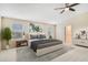 Cozy bedroom with plush carpet, large windows, and a calming aesthetic at 1706 Leatherback Ln, St Cloud, FL 34771