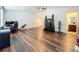 Spacious bedroom features wood-look flooring with doors leading to the bathroom and another room at 1706 Leatherback Ln, St Cloud, FL 34771