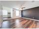This bonus room features wood-look flooring, and a ceiling fan at 1706 Leatherback Ln, St Cloud, FL 34771