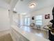 Bright foyer featuring decorative glass doors, custom furniture, and easy access to the second floor at 1706 Leatherback Ln, St Cloud, FL 34771
