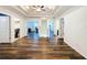 Hallway with wood-look flooring, recessed lighting, and access to other rooms at 1706 Leatherback Ln, St Cloud, FL 34771