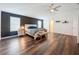 The main bedroom is spacious with contemporary decor and hard wood flooring at 1706 Leatherback Ln, St Cloud, FL 34771