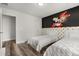 Comfortable bedroom featuring twin beds, themed decor, and stylish wood-look floors at 1801 Nice Ct, Kissimmee, FL 34747