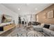 Stylish living room with contemporary furniture, a modern rug, and an open layout at 1801 Nice Ct, Kissimmee, FL 34747