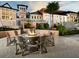 Community clubhouse features an outdoor fire pit with comfortable seating for gatherings and relaxation at 1929 Tropical Palms Cir, Kissimmee, FL 34747
