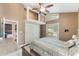 Comfortable bedroom featuring bonus space with windows, ceiling fan, and closet at 202 Sweetwater Club Blvd, Longwood, FL 32779