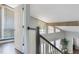 Hallway featuring high ceilings, lots of light and access to a balcony area at 202 Sweetwater Club Blvd, Longwood, FL 32779